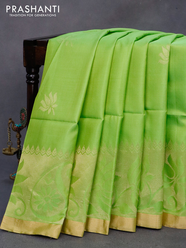 Pure soft silk saree light green and pink with zari woven floral buttas and long zari woven border