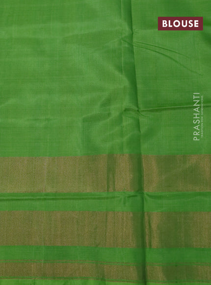 Rajkota potala silk saree dual shade of pink and green with allover ikat butta weaves and long ikat woven zari border