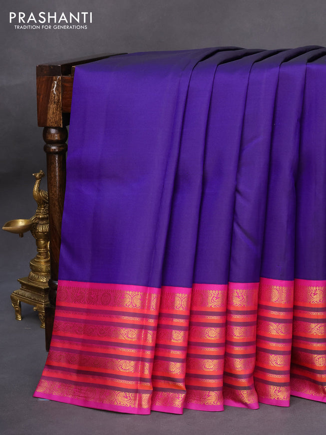 Pure kanchipuram silk saree blue and purple with plain body and zari woven border