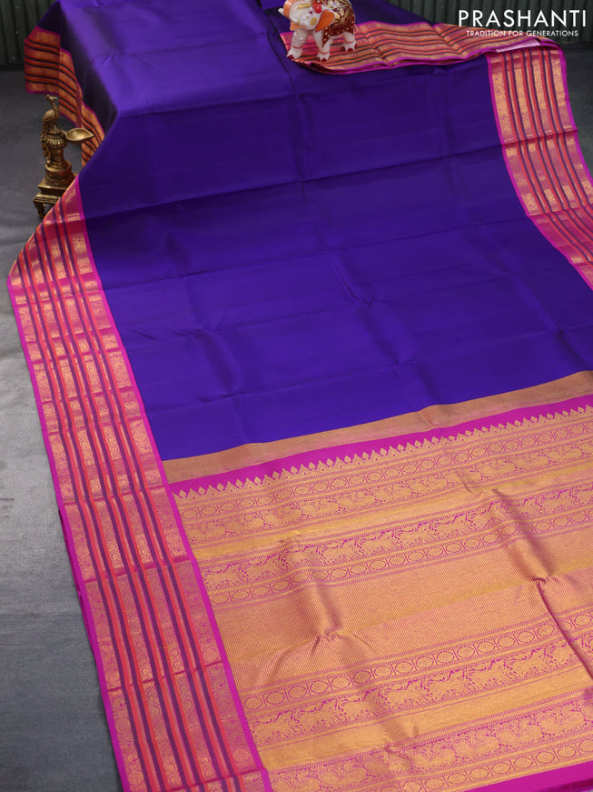 Pure kanchipuram silk saree blue and purple with plain body and zari woven border