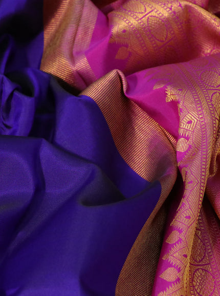 Pure kanchipuram silk saree blue and purple with plain body and zari woven border