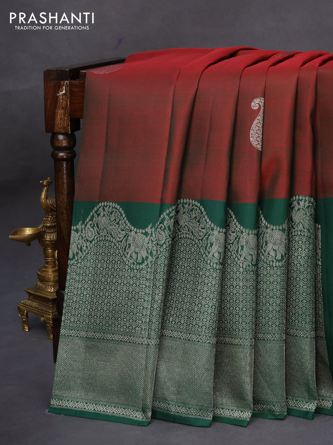 Pure kanchipuram silk saree dual shade of maroon and green with silver zari woven paisley buttas and long silver zari woven border