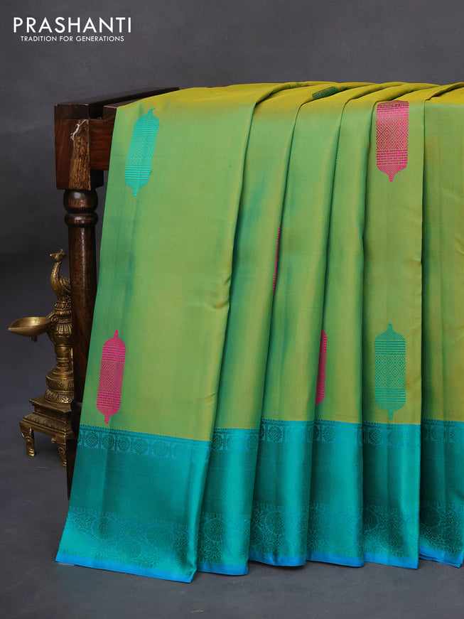 Pure kanchipuram silk saree dual shade of light green and blue with thread woven buttas and thread woven border