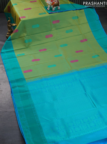 Pure kanchipuram silk saree dual shade of light green and blue with thread woven buttas and thread woven border