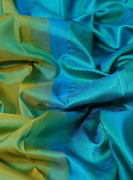 Pure kanchipuram silk saree dual shade of light green and blue with thread woven buttas and thread woven border