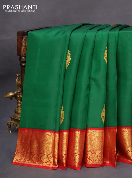 Pure kanchipuram silk saree dsrk green and maroon with zari woven buttas and rich zari woven border