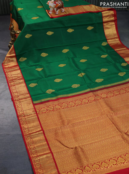 Pure kanchipuram silk saree dsrk green and maroon with zari woven buttas and rich zari woven border