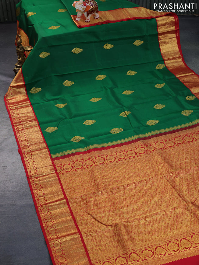 Pure kanchipuram silk saree dsrk green and maroon with zari woven buttas and rich zari woven border