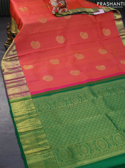 Pure kanchipuram silk saree dual shade of pinkish orange and green with allover zari woven brocade weaves and floral zari woven border