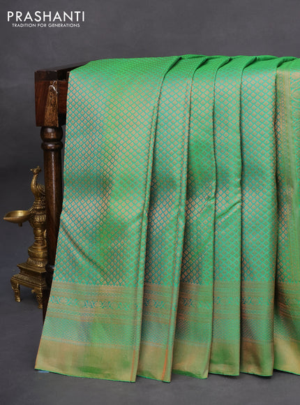 Pure kanchipuram silk saree dual shade of green and navy blue with allover copper zari woven brocade weaves and zari woven border