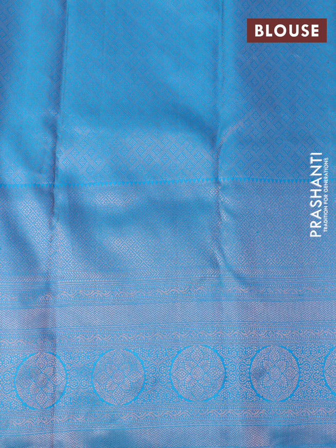 Pure kanchipuram silk saree dual shade of orange and cs blue with allover copper zari woven brocade weaves and long zari woven border