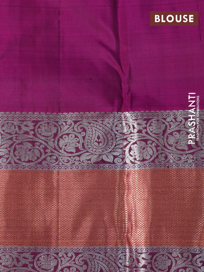 Pure kanchipuram silk saree dark green and purple with silver & gold zari woven buttas and long zari woven border