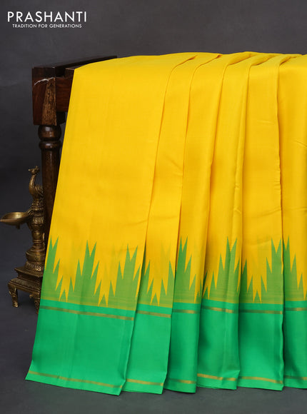 Pure kanchipuram silk saree yellow and green with plain body and temple design rettapet zari woven border