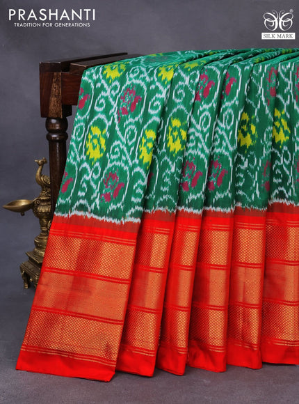 Pochampally silk saree green and orange with allover ikat weaves and long zari woven border