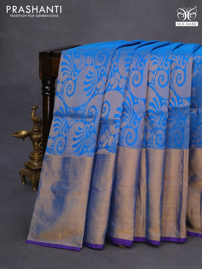 Pure uppada silk saree cs blue and blue with allover zari woven brocade weaves and long zari woven border