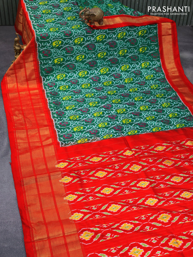 Pochampally silk saree green and orange with allover ikat weaves and long zari woven border