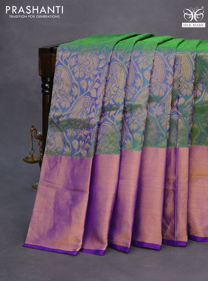 Pure uppada silk saree dual shade of green and blue with allover zari woven brocade weaves and long zari woven border