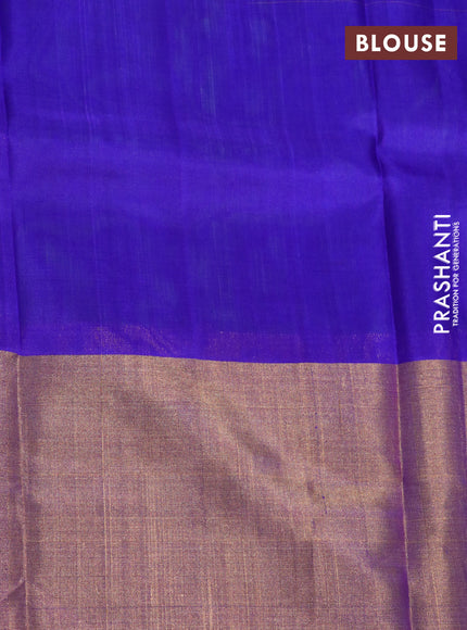 Pure uppada silk saree dual shade of green and blue with allover zari woven brocade weaves and long zari woven border