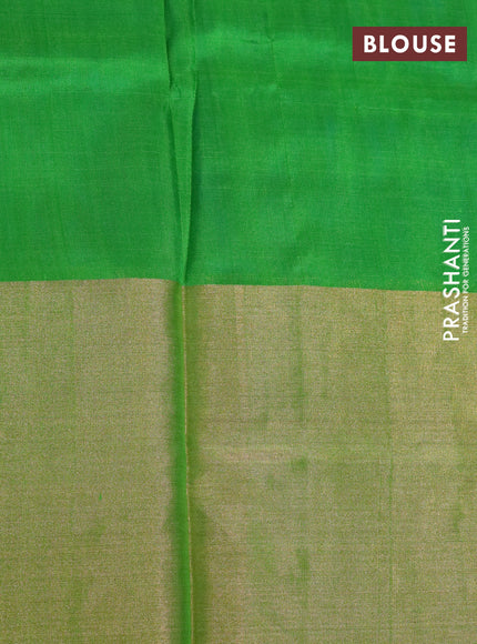 Pure uppada silk saree cs blue and green with allover zari woven brocade weaves and long zari woven border