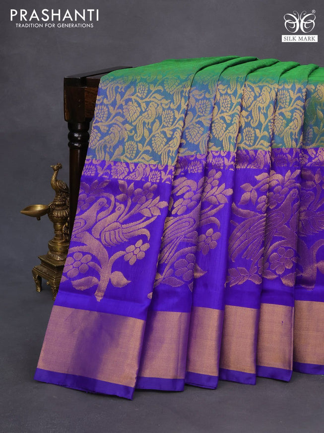 Pure uppada silk saree dual shade of bluish green and blue with allover zari woven brocade weaves and long zari woven border