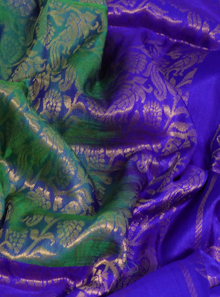 Pure uppada silk saree dual shade of bluish green and blue with allover zari woven brocade weaves and long zari woven border