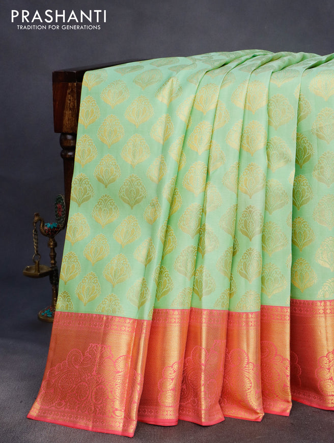 Pure kanchipuram silk saree pista green and pink with zari woven buttas and zari woven border