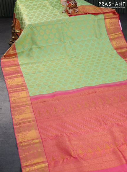 Pure kanchipuram silk saree pista green and pink with zari woven buttas and zari woven border