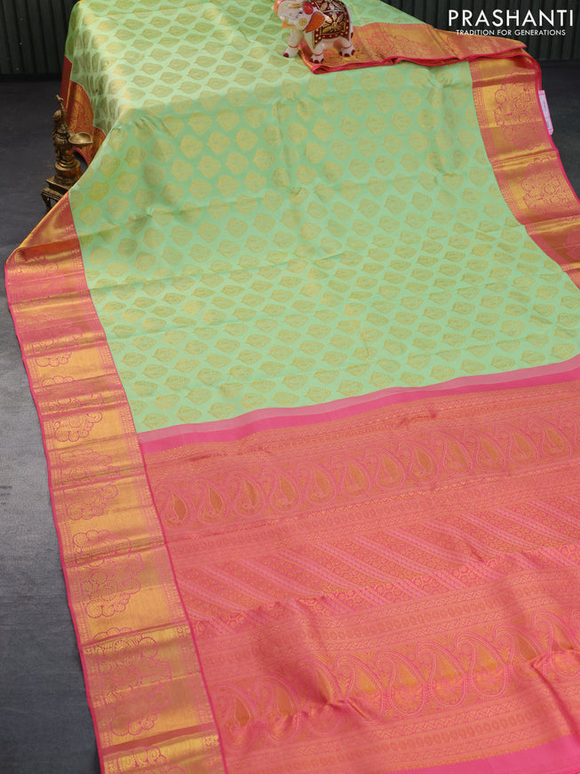 Pure kanchipuram silk saree pista green and pink with zari woven buttas and zari woven border