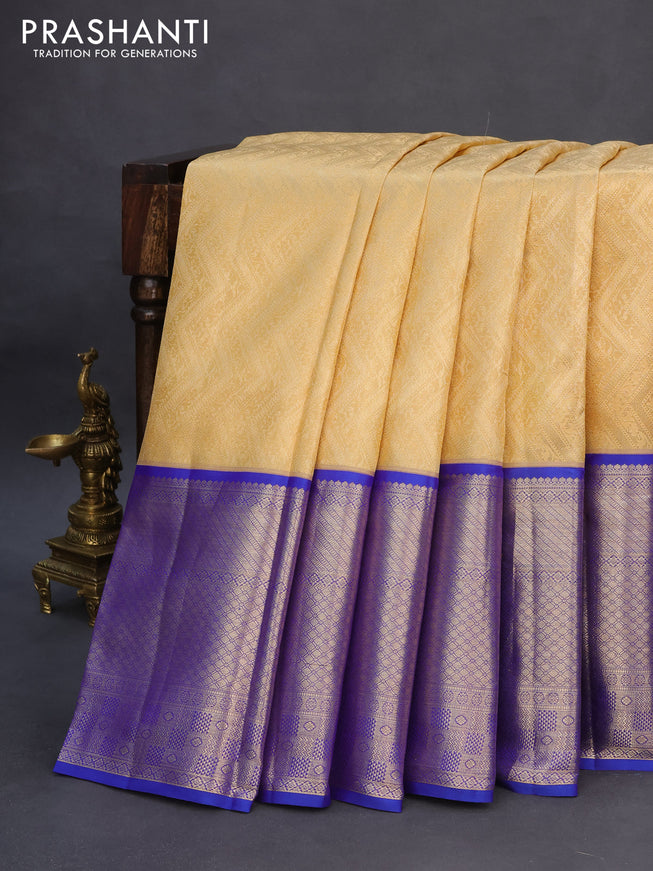 Pure kanchipuram silk saree sandal and blue with allover zari woven brocade weaves and long zari woven border