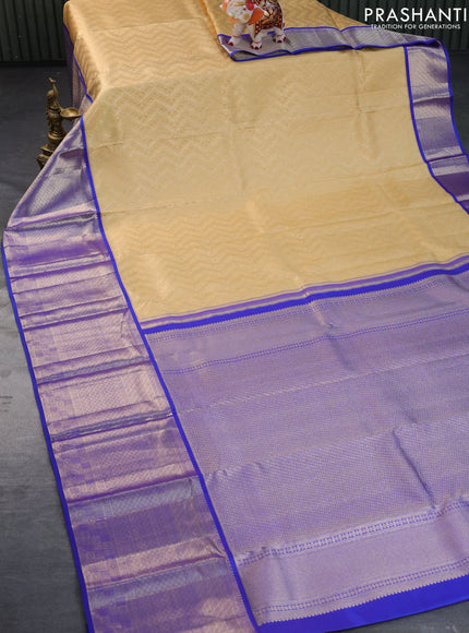 Pure kanchipuram silk saree sandal and blue with allover zari woven brocade weaves and long zari woven border