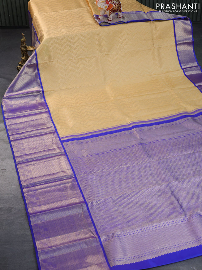 Pure kanchipuram silk saree sandal and blue with allover zari woven brocade weaves and long zari woven border