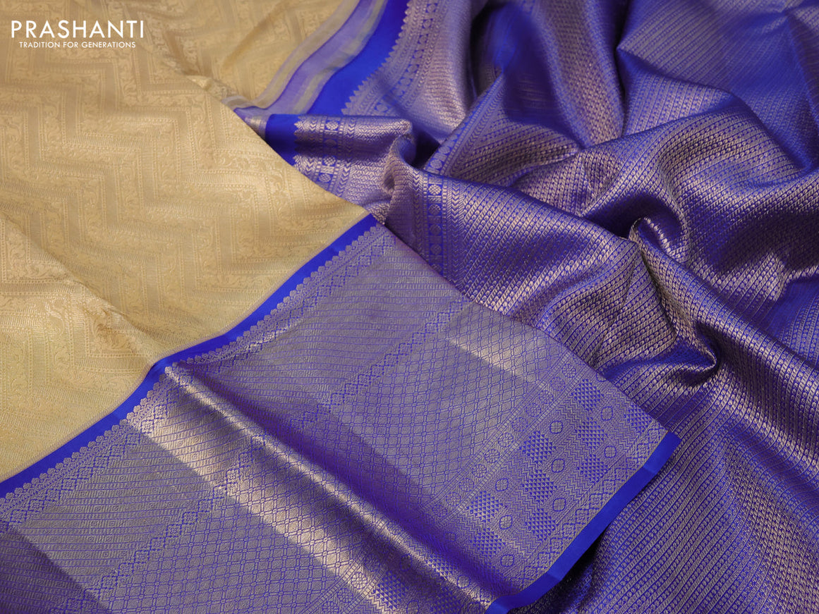 Pure kanchipuram silk saree sandal and blue with allover zari woven brocade weaves and long zari woven border