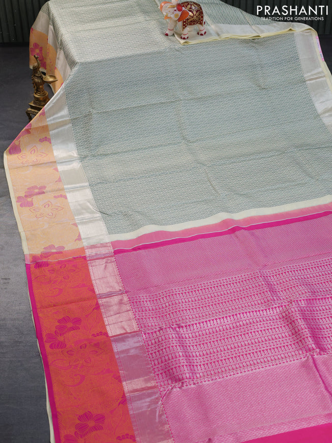 Pure kanchipuram silk saree cream and pink with allover self emboss and zari woven floral design border