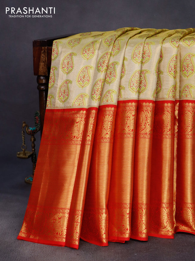 Pure kanchipuram tissue silk saree gold and red with allover zari woven brocade weaves and long zari woven border