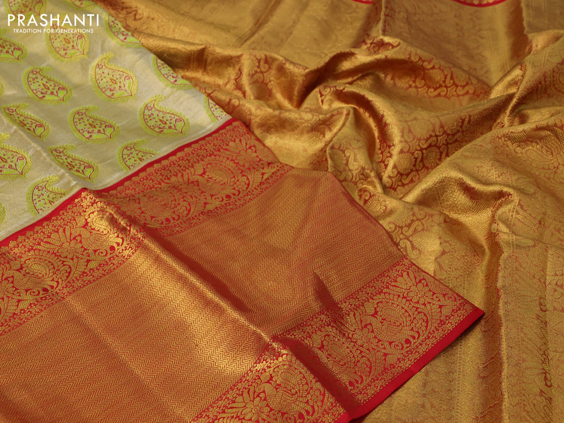 Pure kanchipuram tissue silk saree gold and red with allover zari woven brocade weaves and long zari woven border