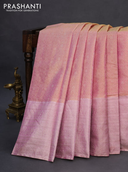 Pure kanchipuram tissue silk saree dual shade of goldish pink and light pink with allover zari woven brocade weaves and silver zari woven border