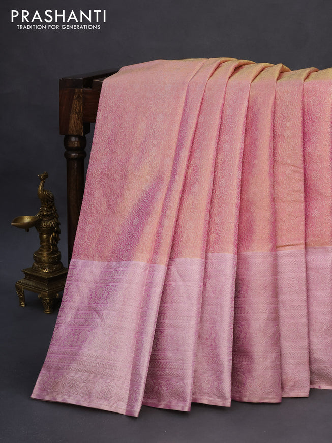 Pure kanchipuram tissue silk saree dual shade of goldish pink and light pink with allover zari woven brocade weaves and silver zari woven border