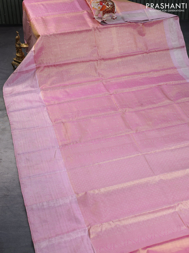 Pure kanchipuram tissue silk saree dual shade of goldish pink and light pink with allover zari woven brocade weaves and silver zari woven border