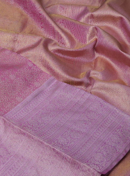 Pure kanchipuram tissue silk saree dual shade of goldish pink and light pink with allover zari woven brocade weaves and silver zari woven border