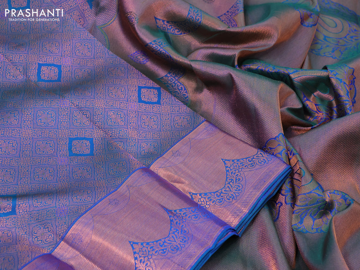 Pure kanchipuram silk saree dual shade of peacock blue with allover zari woven brocade weaves and copper zari woven border