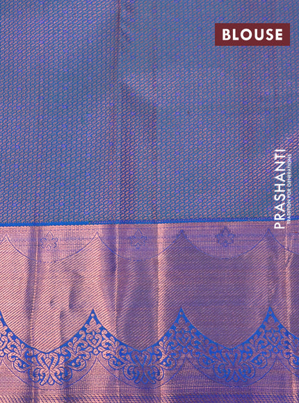 Pure kanchipuram silk saree dual shade of peacock blue with allover zari woven brocade weaves and copper zari woven border