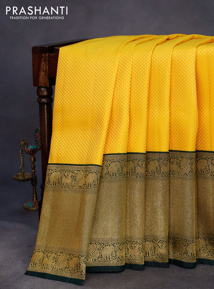 Pure kanchipuram silk saree yellow and green with allover self emboss and long zari woven border