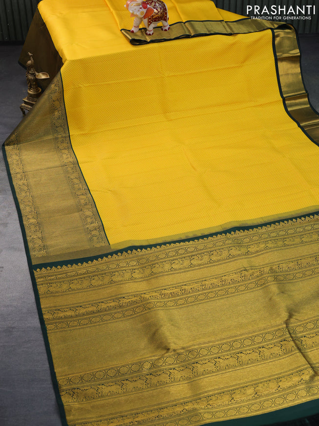 Pure kanchipuram silk saree yellow and green with allover self emboss and long zari woven border