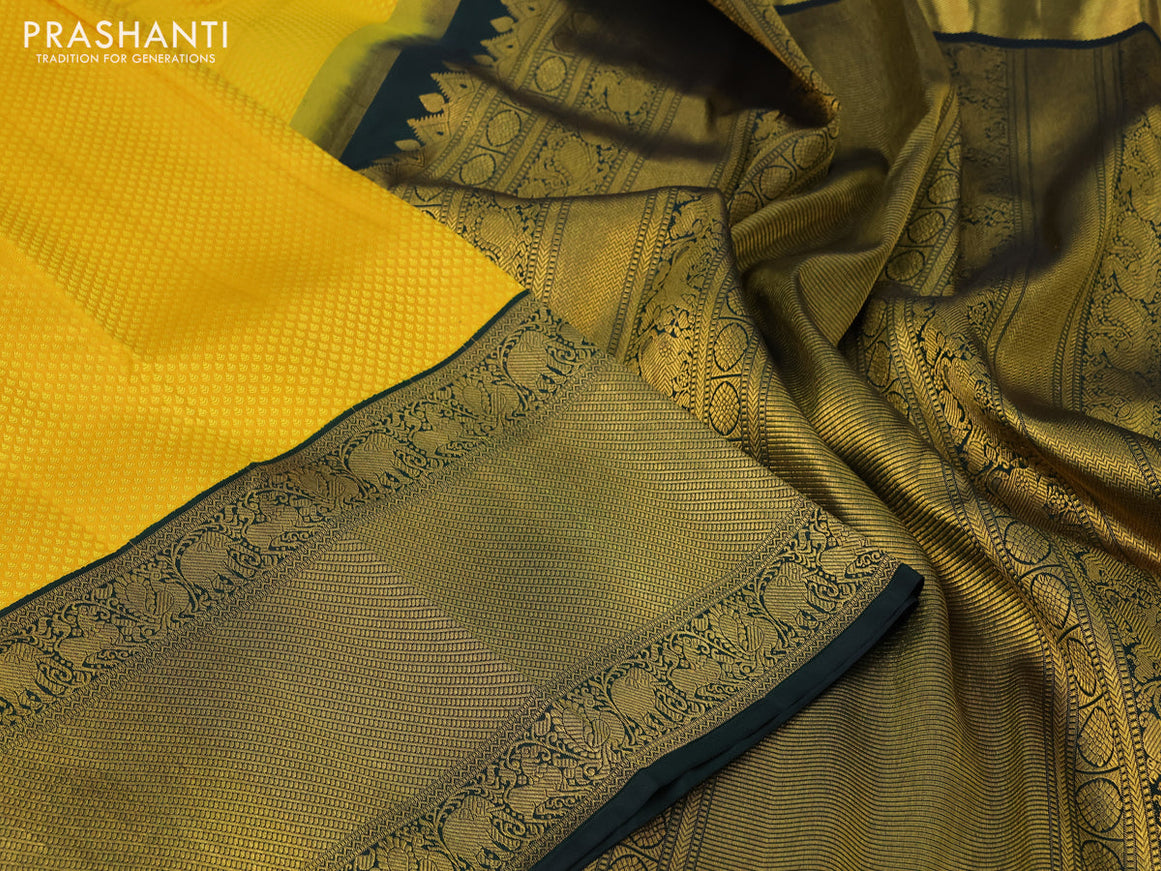 Pure kanchipuram silk saree yellow and green with allover self emboss and long zari woven border