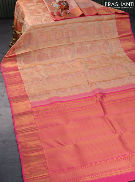 Pure kanchipuram tissue silk saree sandal and pink with allover zari woven brocade weaves and zari woven border