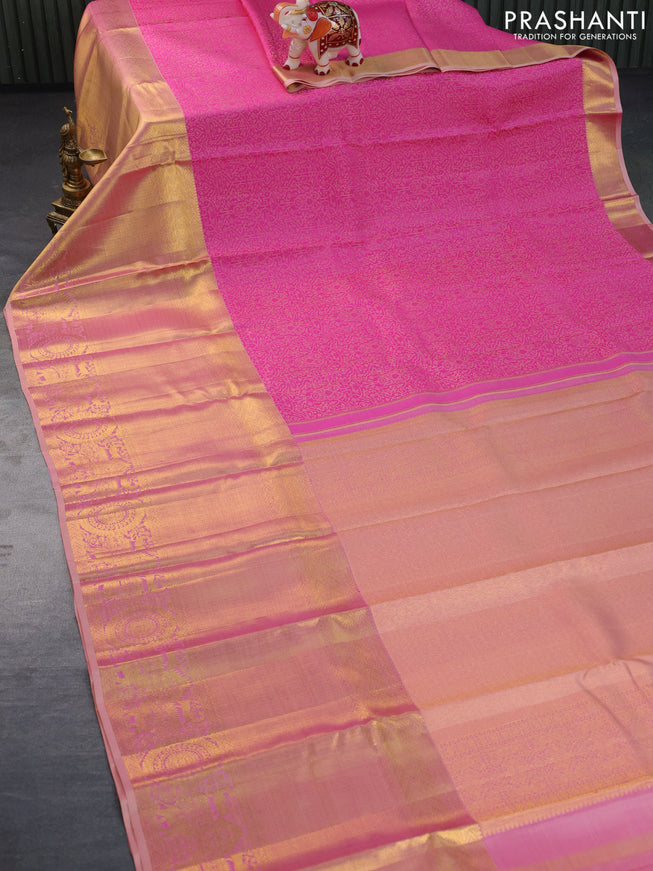 Pure kanchipuram silk saree pink and dual shade of sandal with allover self emboss and long zari woven border