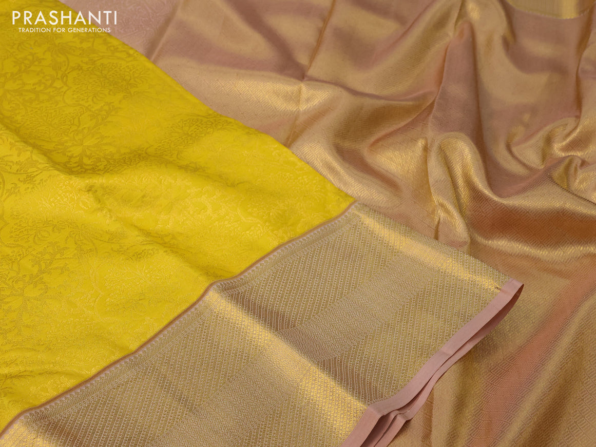 Pure kanchipuram silk saree yellow and sandal with allover zari woven brocade weaves and zari woven border