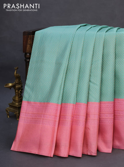 Pure kanchipuram silk saree teal blue and light pink with allover zari woven brocade weaves and copper zari woven border