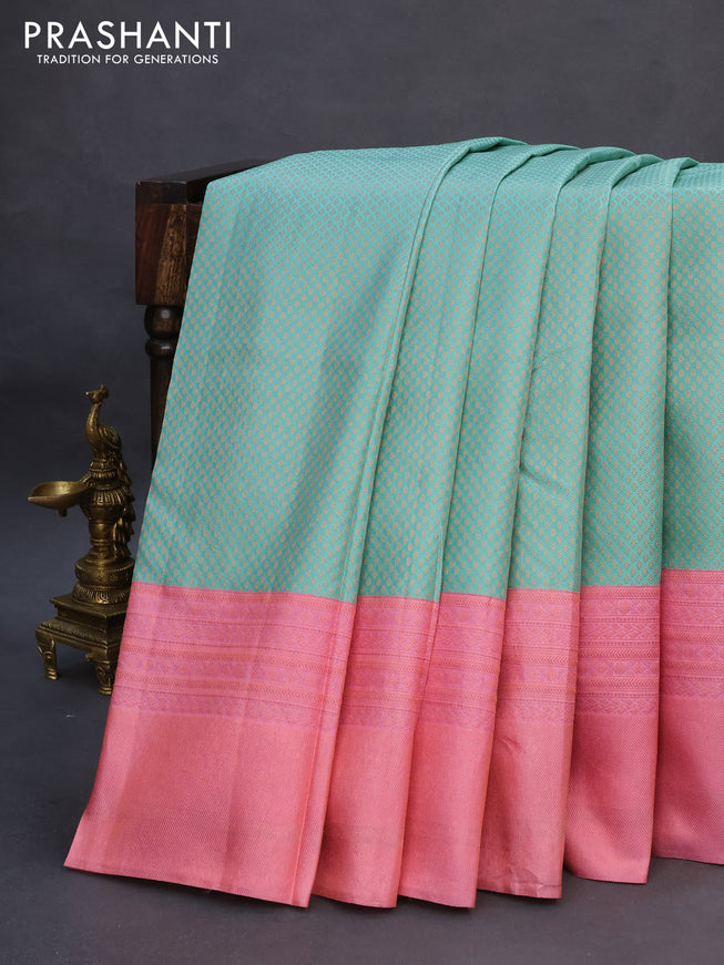 Pure kanchipuram silk saree teal blue and light pink with allover zari woven brocade weaves and copper zari woven border