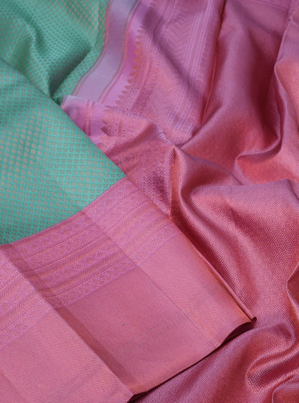 Pure kanchipuram silk saree teal blue and light pink with allover zari woven brocade weaves and copper zari woven border